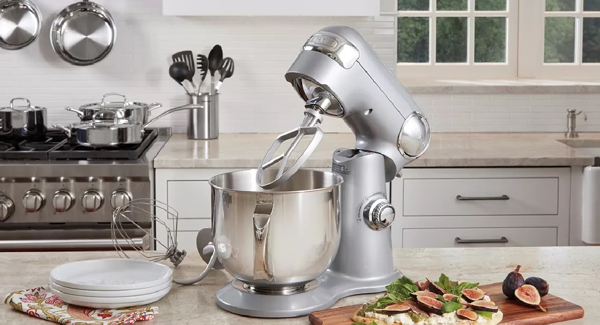 stainless steel Cuisinart stand Mixer on kitchen counter with a charcuterie board with figs and cheese