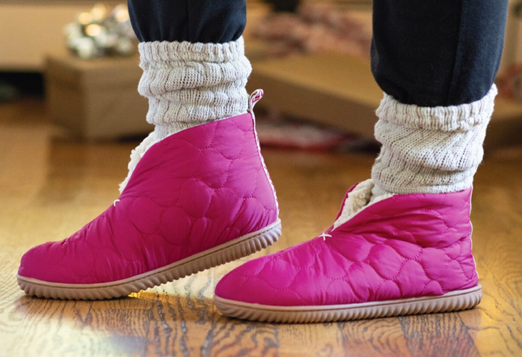 woman wearing pink slipper booties