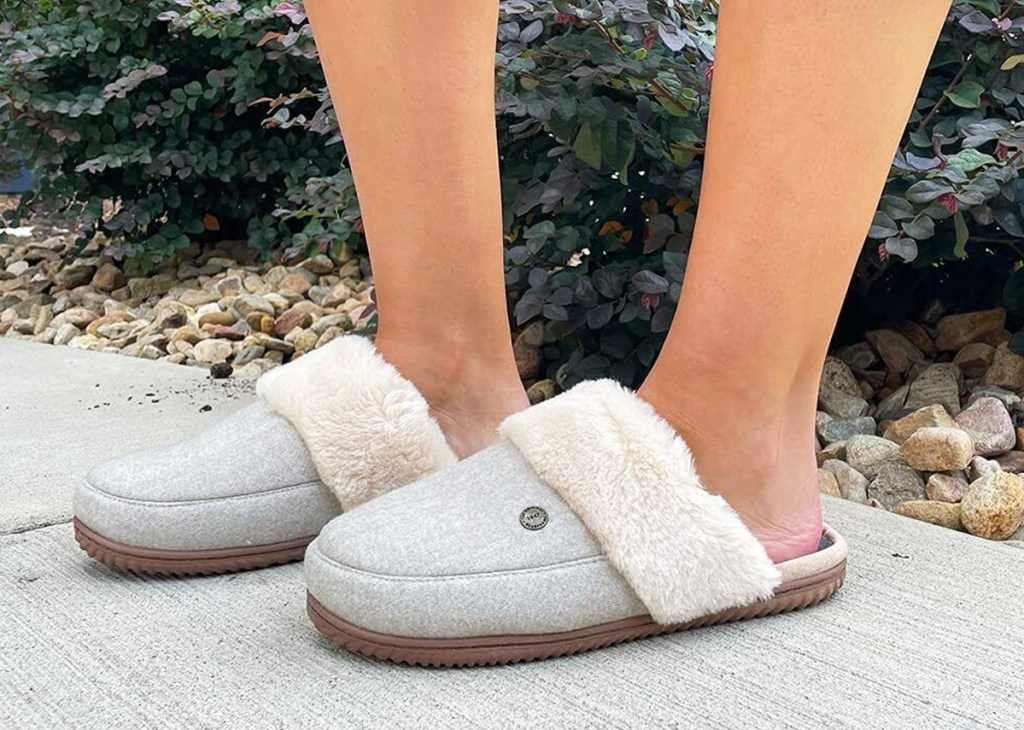 woman wearing dearfoams slippers outside
