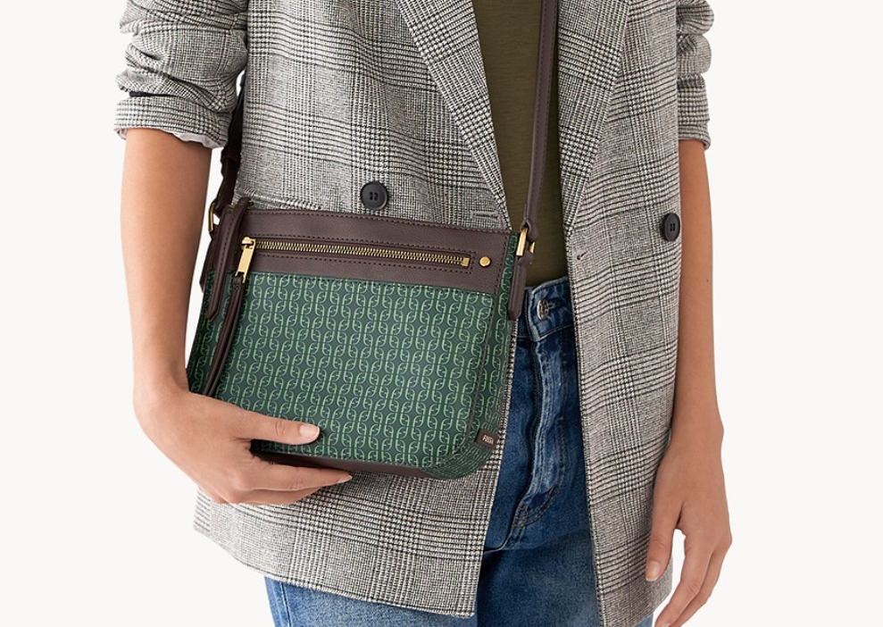woman holding a Fossil Farrah Crossbody