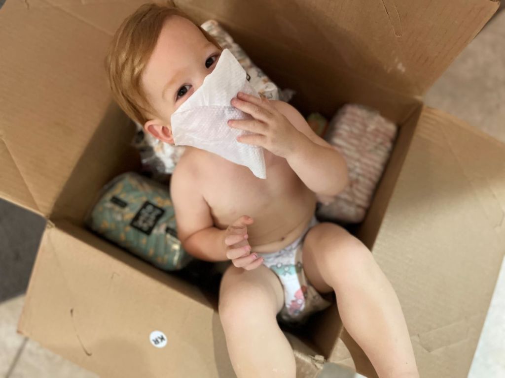 baby sitting in a box