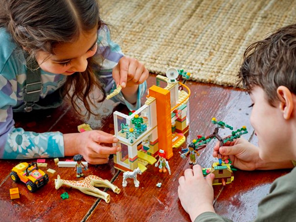 kids playing with LEGO wildlife rescue set