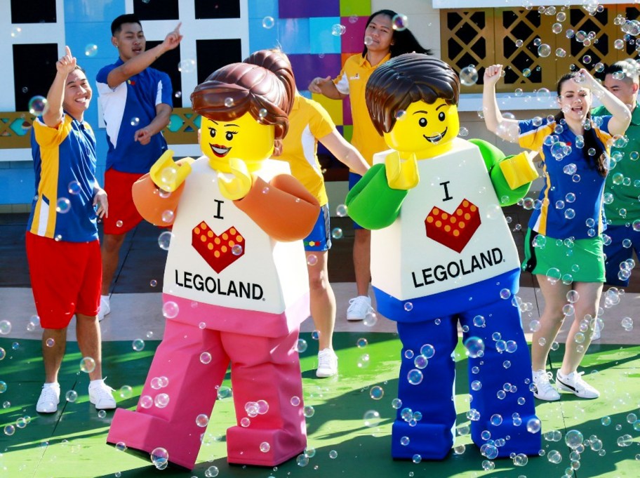 lego characters dancing with bubbles around them
