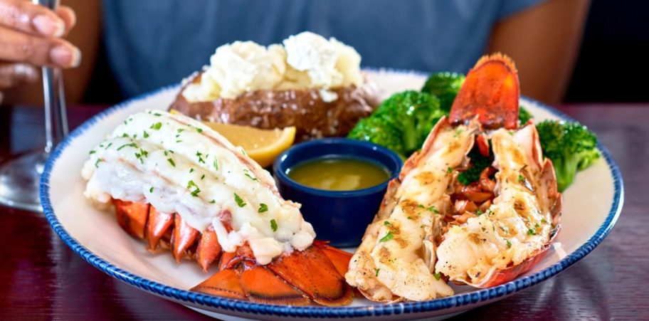 A plate of Red Lobster food containing the Lobsterfest offering of two lobster tails