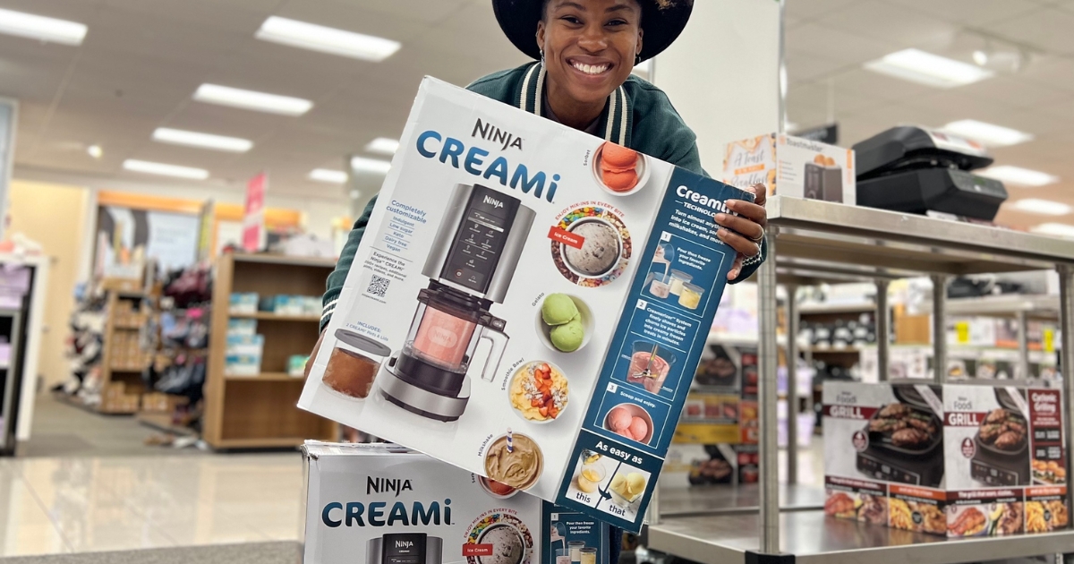 woman holding ninja creami ice cream maker box