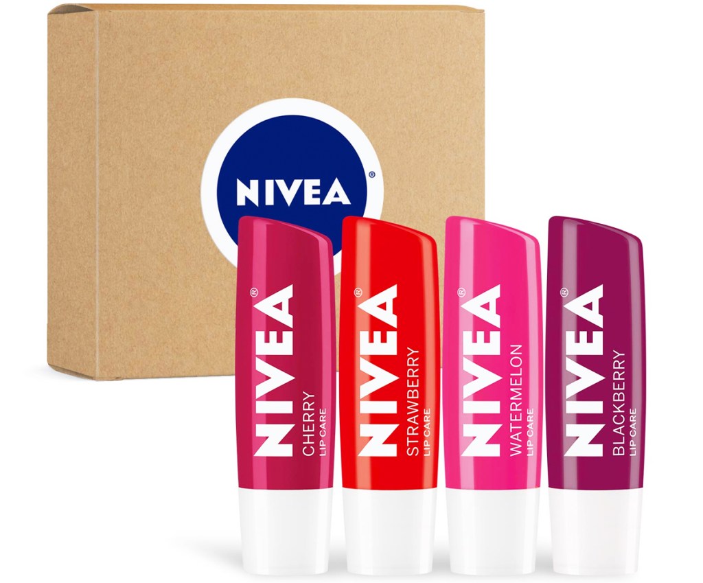 four tubes of nivea lip balm in front of cardboard box