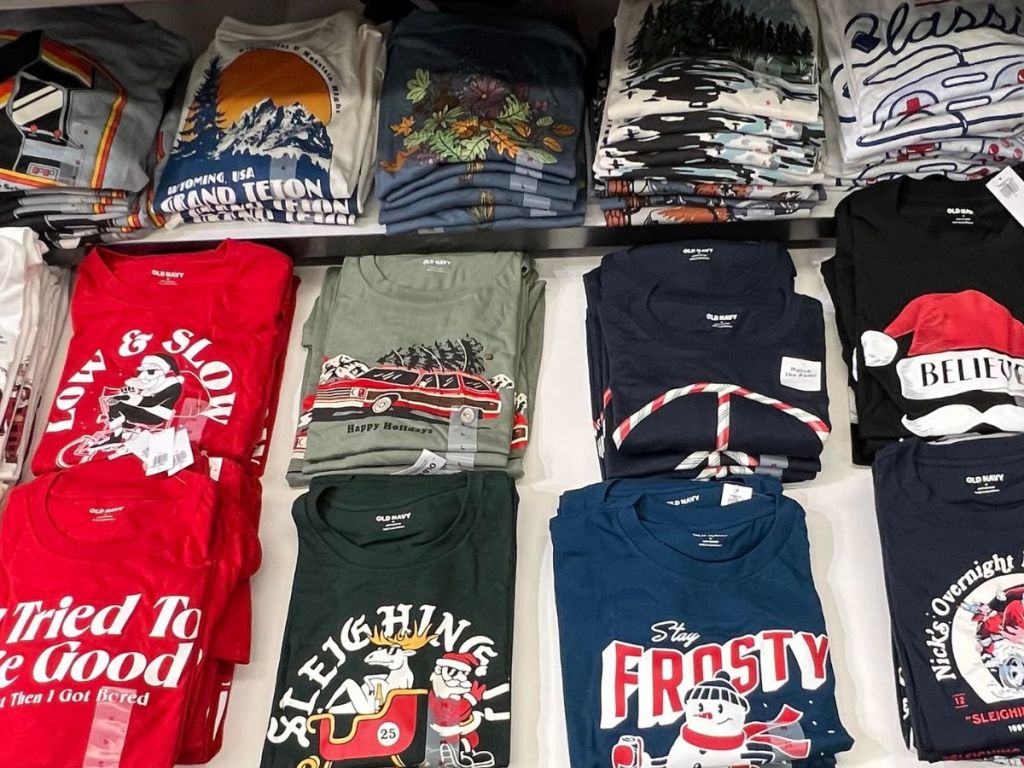 A table of men's graphic tees at old navy