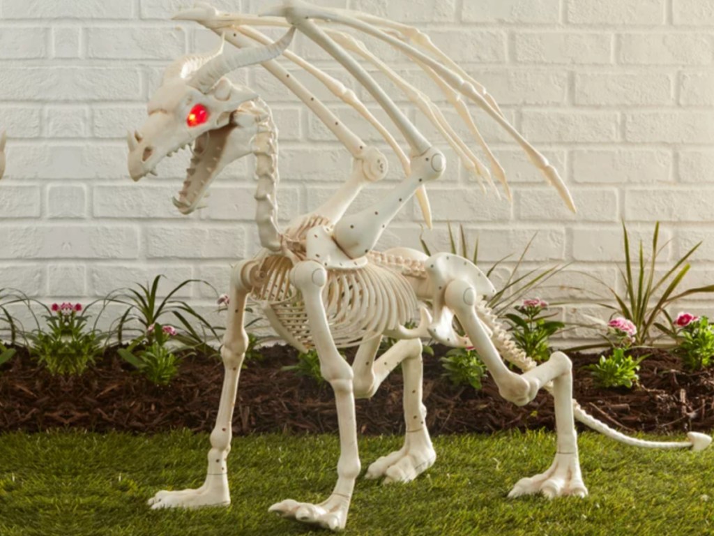 Plastic Dragon Skeleton outside in yard