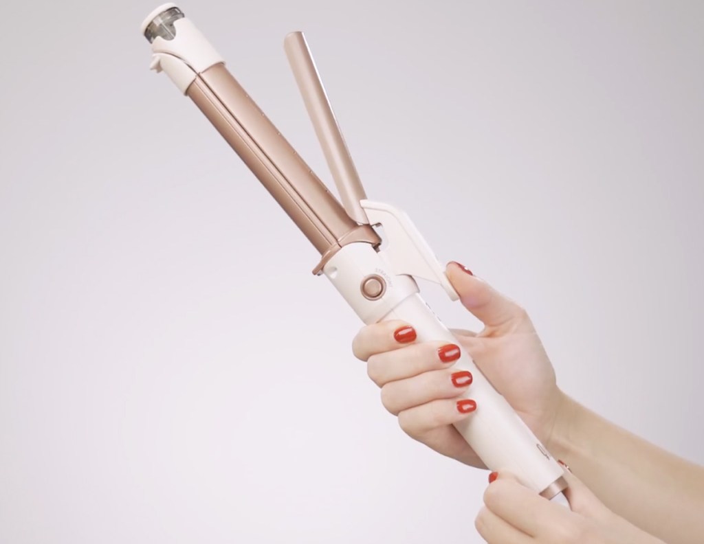 hand holding 2-in-1 hair tool