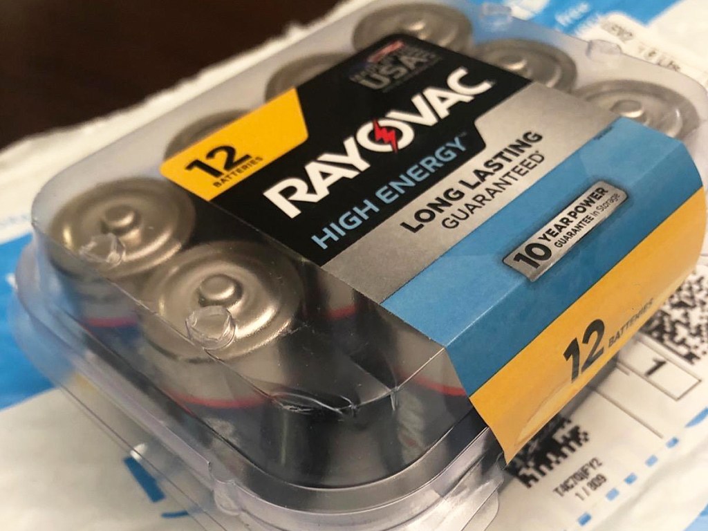 plastic package of Rayovac Batteries on top of an Amazon bubble mailer