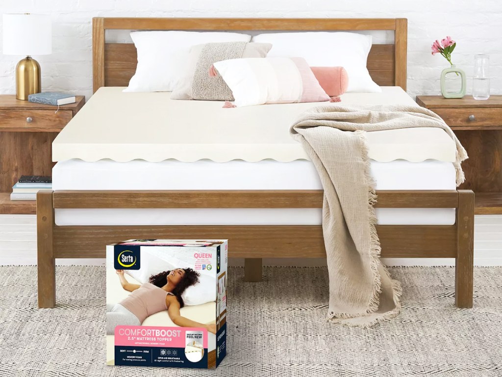 Serta Memory Foam Mattress Topper on a bed with a wood bed frame