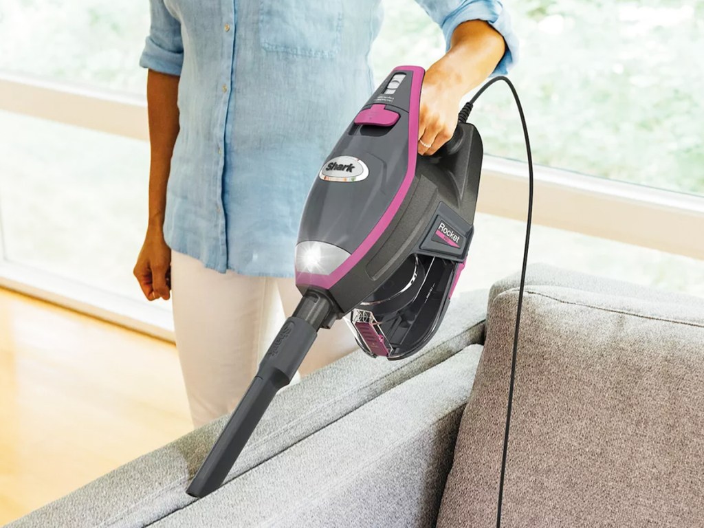 cleaning couch with shark vacuum and crevice tool