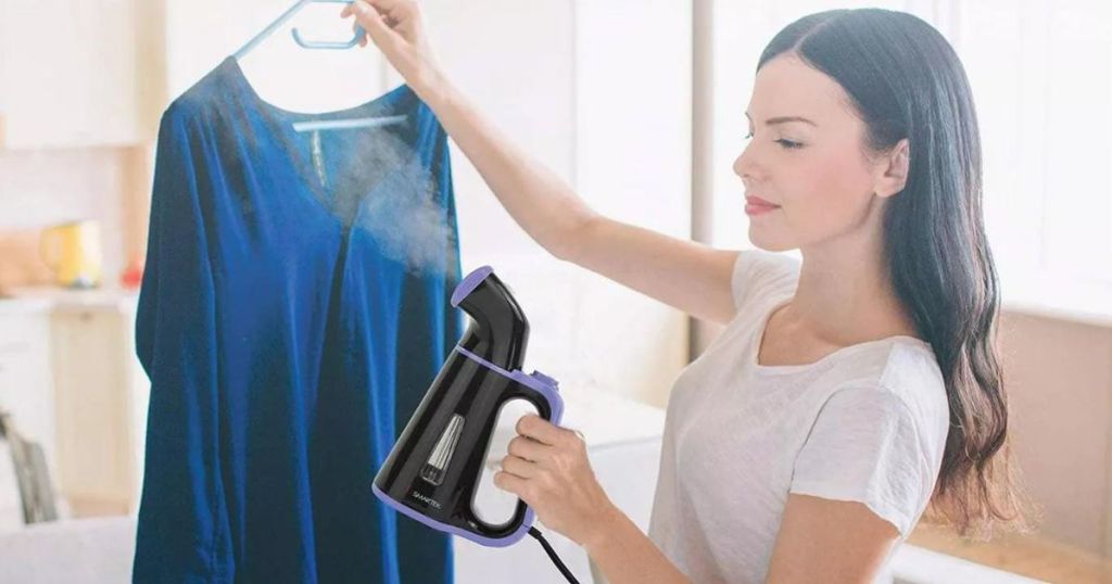 woman using a Smartek Handheld Steamer