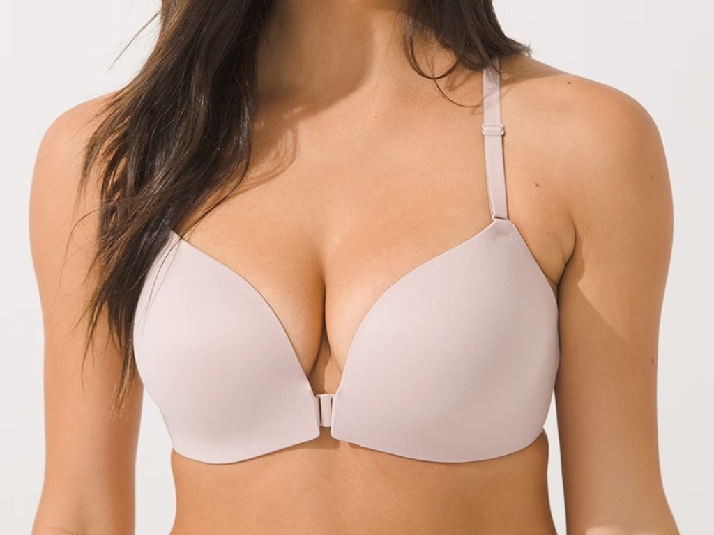 woman in light pink front close bra
