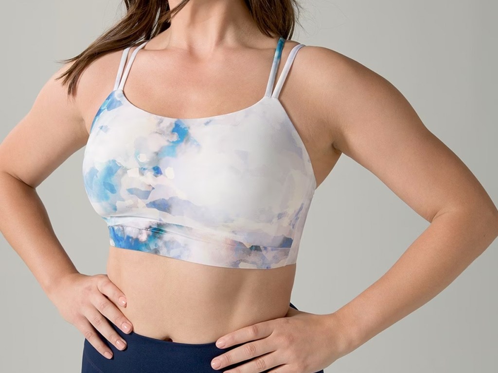 woman in white and blue sports bra