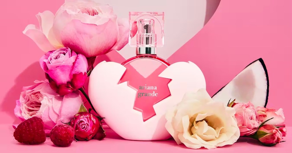 1oz bottle of ariana grande thank u next perfume with fruit and flowers