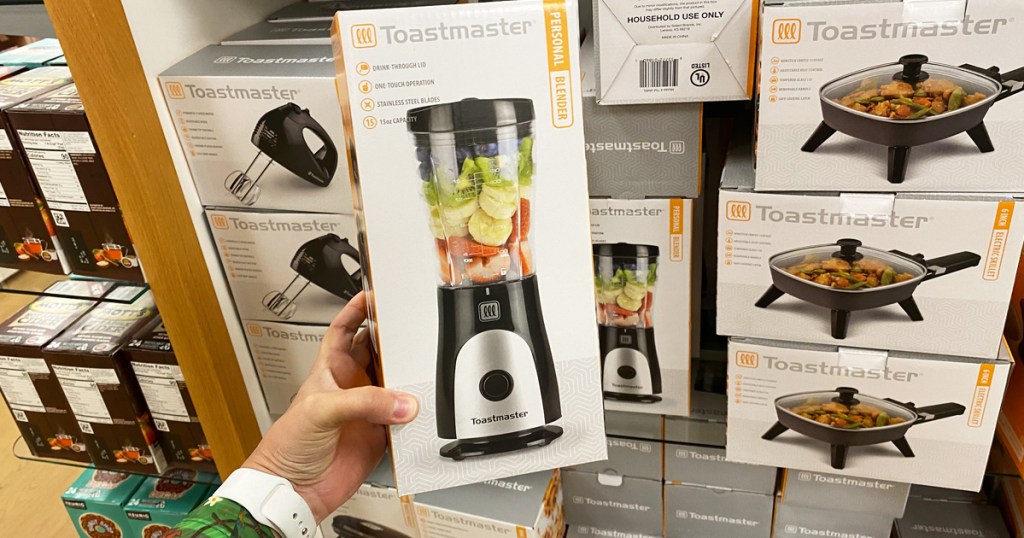 hand holding a toastmaster blender