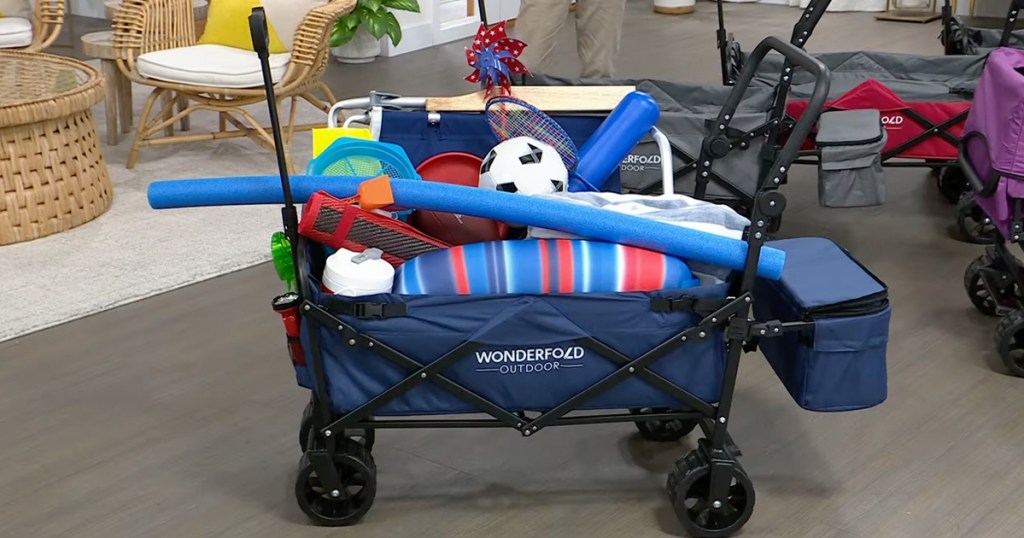 kids beach gear stacked inside blue wonderfold wagon