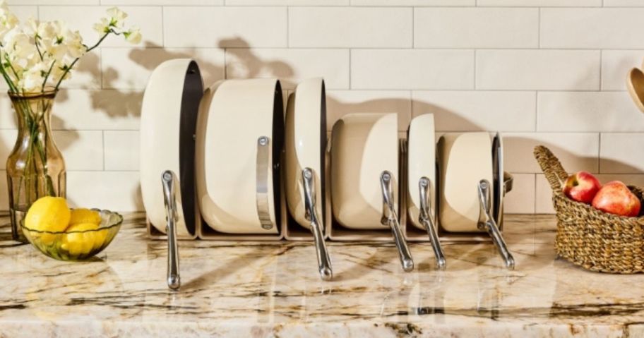 caraway cookware set on rack on counter