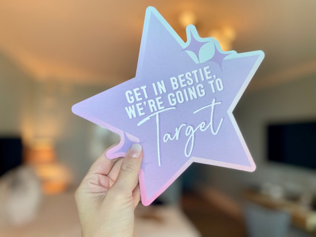 holding a carstock star with an ad for Target