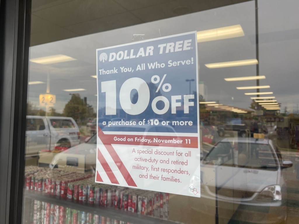 Veterans Day sale sign in Dollar Tree window