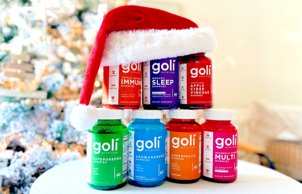 goli vitamins stacked on table with santa hat