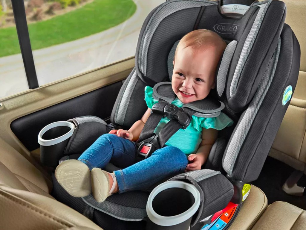 child in graco carseat