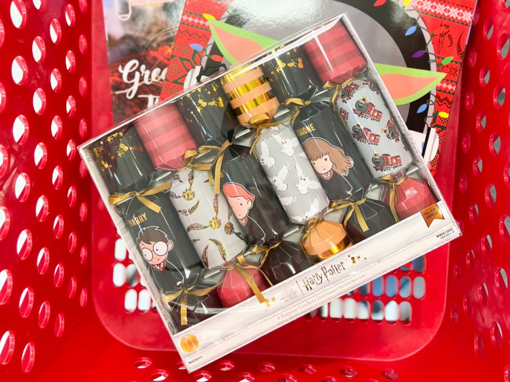target shopping cart filled with socks advent calendars and a box of harry potter surprise crackers socks