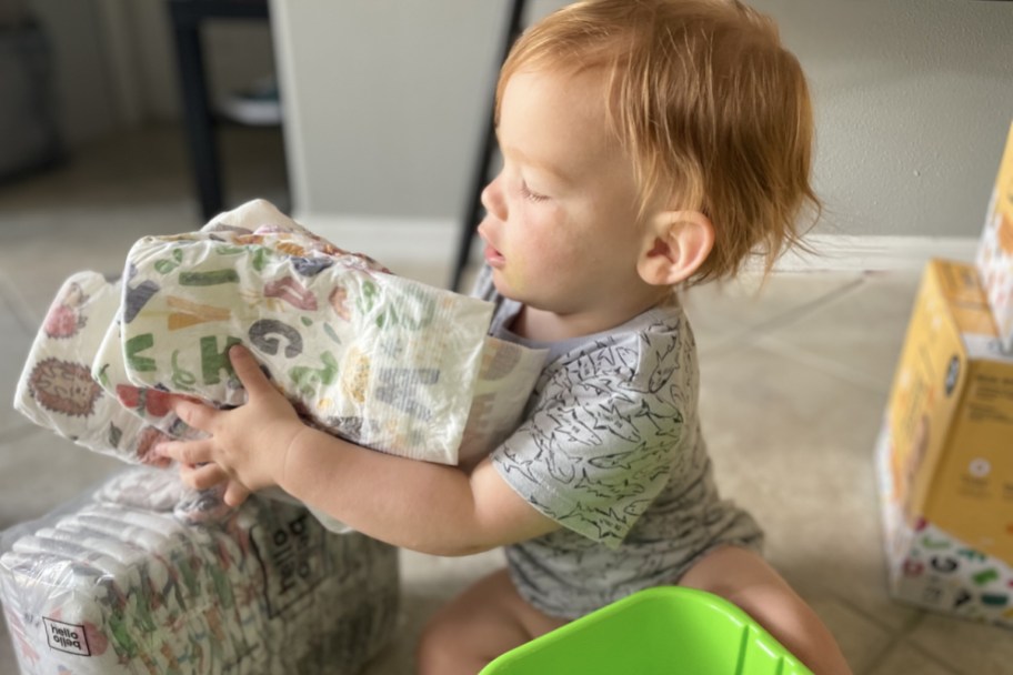 toddler boy playing with cheap hello bello diapers