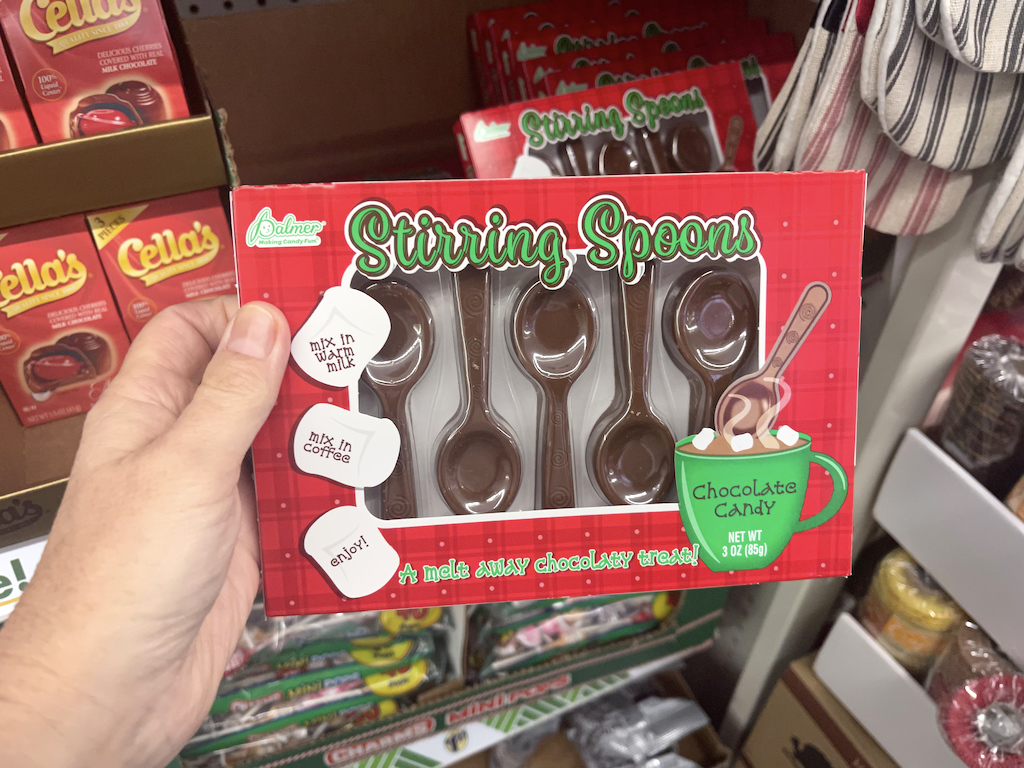 holding Christmas stirring hot cocoa spoons from Dollar Tree 