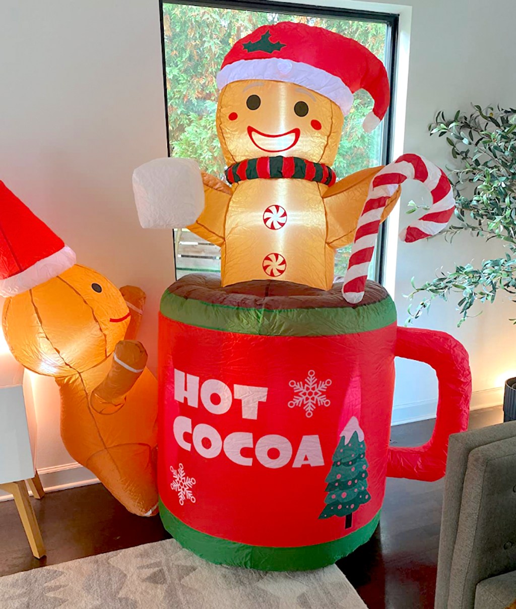 inflatable gingerbread man in hot cocoa mug