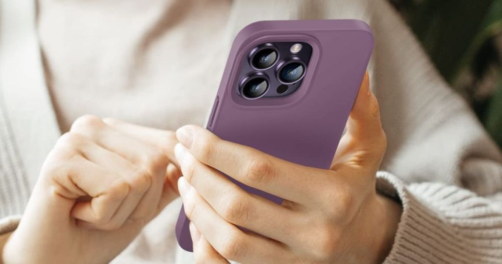 person holding purple iphone case
