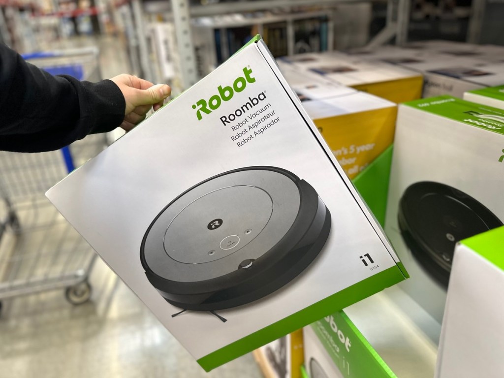 taking robot vacuum of a stack of boxes
