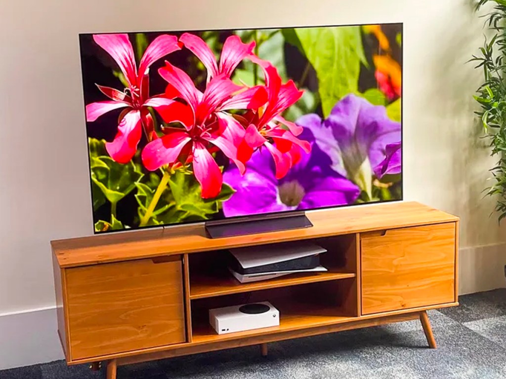 lg a2 tv on brown entertainment center
