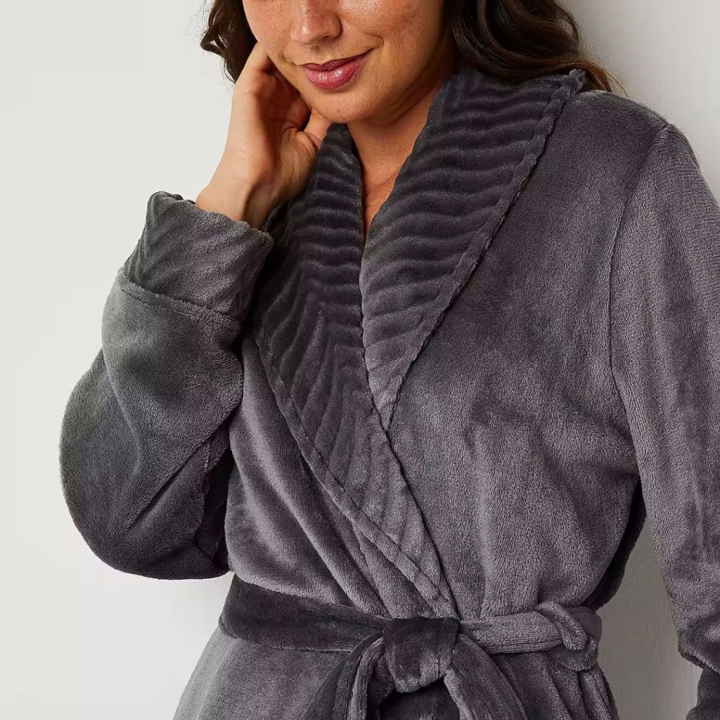woman wearing a grey plush long sleeve robe