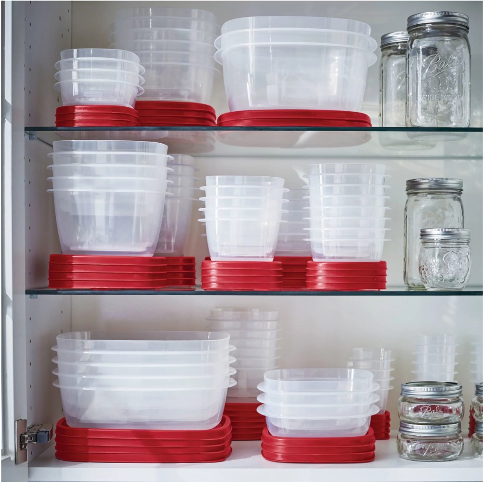 various rubbermaid easyfind containers with lids stacked on a shelf