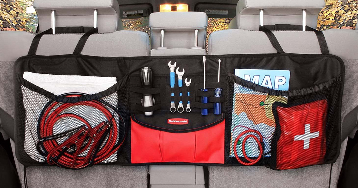 rubbermaid car organizer hanging from the back of car seats filled with supplies