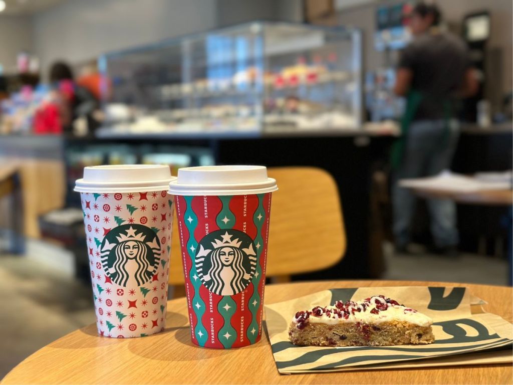 2 starbucks holiday cups and cranberry bliss bar