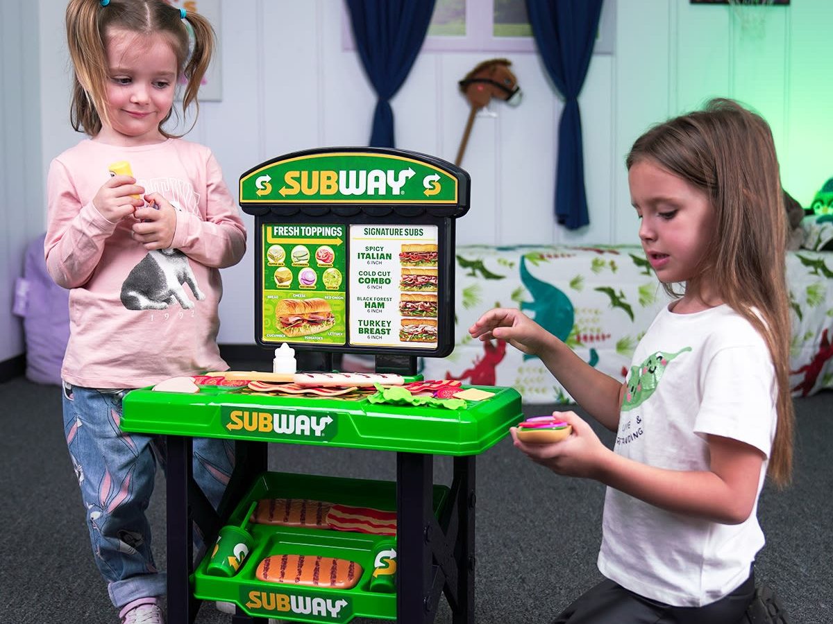 kids playing with a subway sandwich maker playset