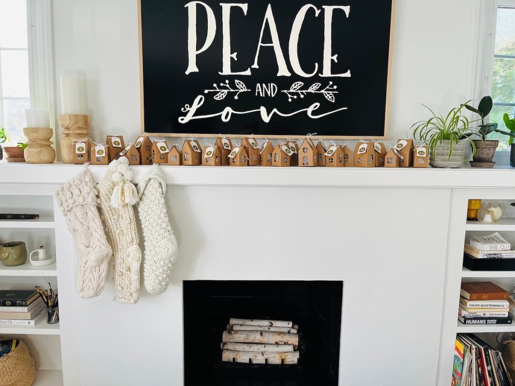 fireplace with TV and mantle and walmart christmas decorations countdown houses