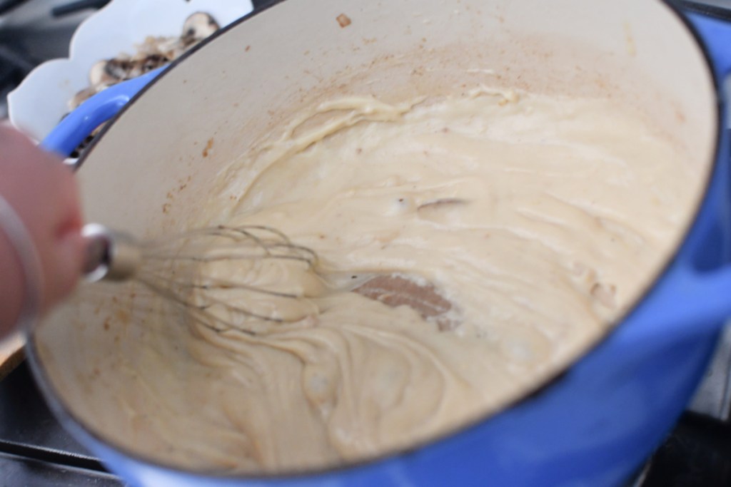 whisking butter flour and milk