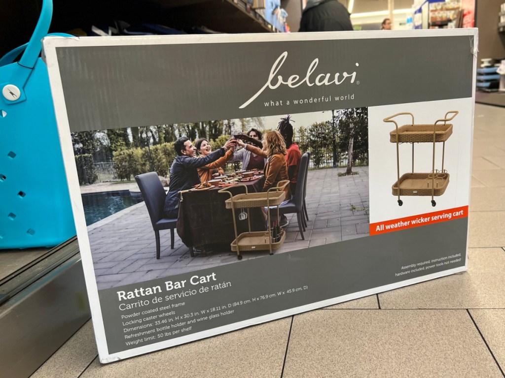Belavi Rattan Bar Cart box displayed on the floor of the store