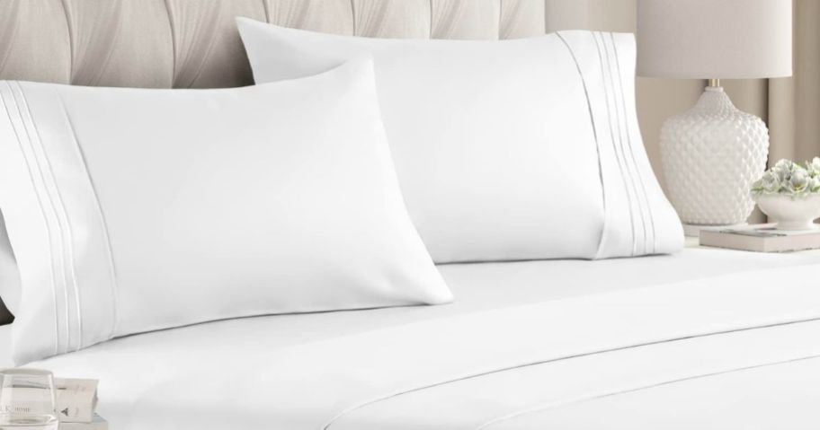 CGK Queen Size 4-piece Sheet Set in white on a bed
