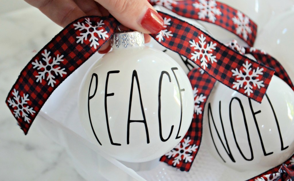 DIY Christmas ornaments using a clear ball and rae dunn lettering