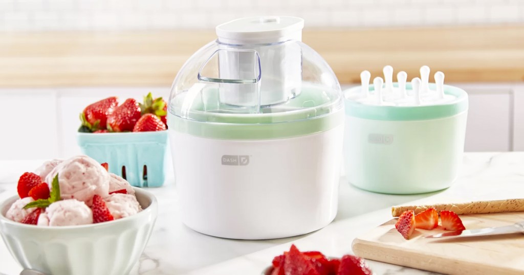 white and green ice cream maker and popsicle mold on kitchen counter