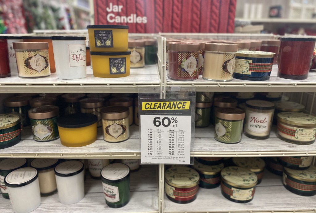 Christmas clearance candles on a store shelf