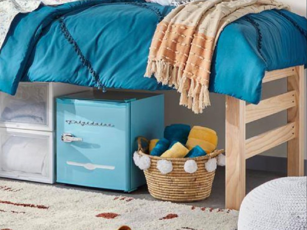 wooden twin bed with room for storage underneath