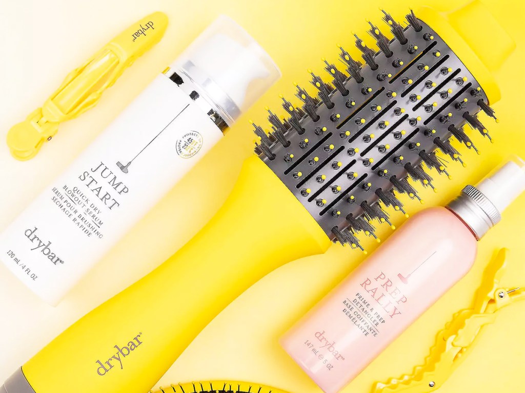 yellow drybar brush with styling products