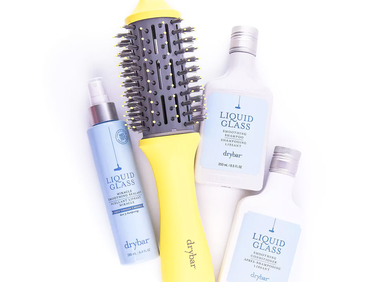 yellow drybar brush with styling products