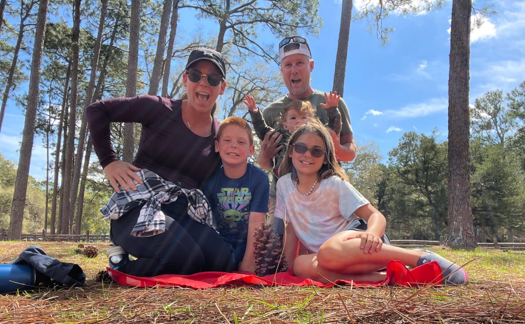 A family enjoying a camping trip thanks to RVshare